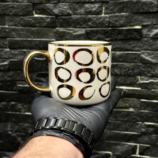 Two Mugs with Golden Circle Patterns