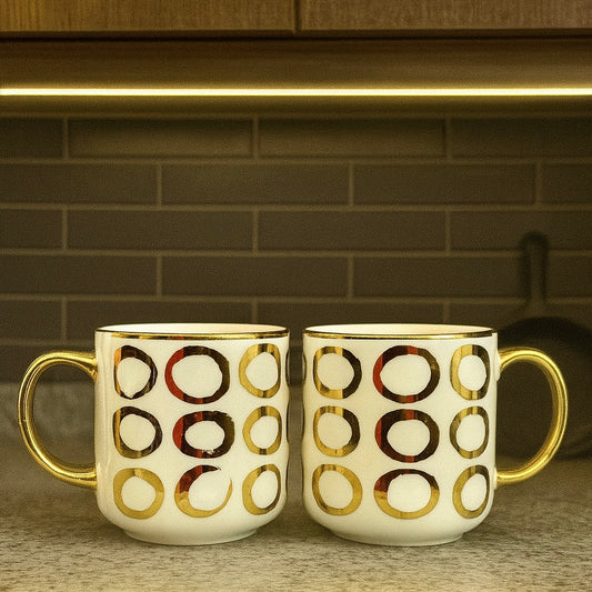 Two Mugs with Golden Circle Patterns